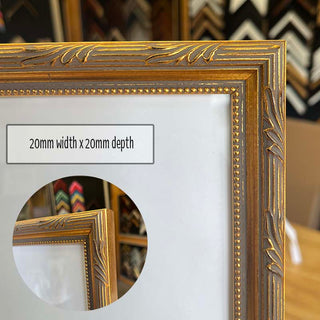 5"x7" Photo Frame in a Strong Gold finish made from quality custom framing materials.