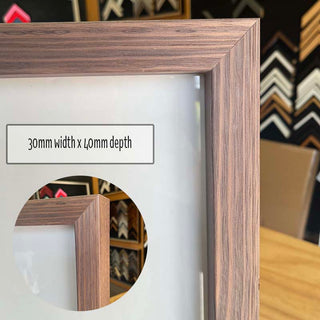 8"x10" Photo Frame in a Pinkish Timber finish with inset lip made from quality custom framing materials.