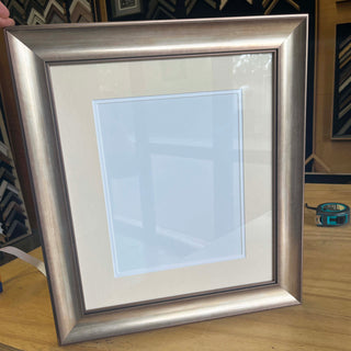 8"x10" Photo Frame in a Dull Silver finish with Double Matboard in Cream and White made from quality custom framing materials.