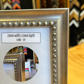 11”x14” Photo Frame in a Ornate Dull Silver finish made from quality custom framing materials.