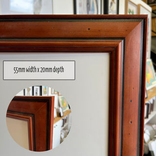 A1 Poster Frame in a Rustic Redish Brown Finish made from quality custom framing materials.