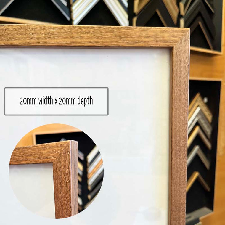 A3 Photo Frame in a Honey Walnut finish made from quality custom framing materials. This frame is a one off made from excess stock and includes quality foamboard, Perspex, and Wire Pack for both vertical and horizontal hanging on the wall. This frame is suited to an A3 (42cm x 29.7cm) Photo or artwork, or you can add a matboard insert to fit a smaller A4 or 8"x10" Photo or Artwork