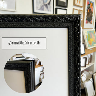 A3 Poster Frame in a Ornate Black Curved finish made from quality custom framing materials.