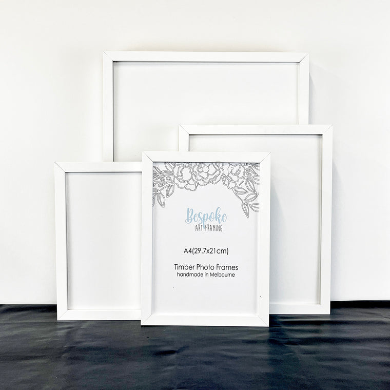 White Photo Frame in a range of Photo and Print Sizes. 11x14", A4, 8"x10", A5, 6"x8". Quality Timber Picture Frame in White made by Custom Framer, includes Perspex and Foam backing 